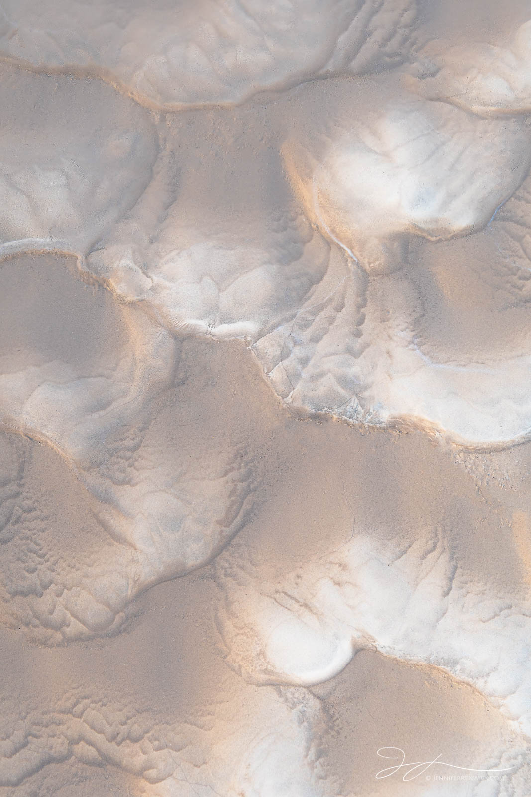 Fresh mud from a flow across the desert floor creates billowy patterns.