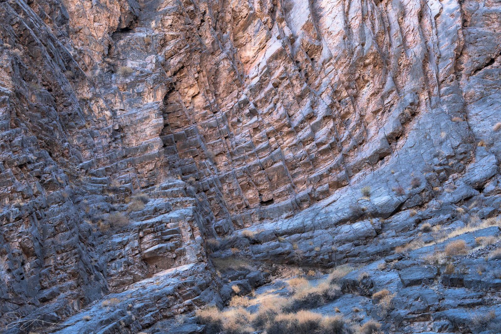 Canyon Architecture Layers and soft light adorn a remote canyon wall in the desert.