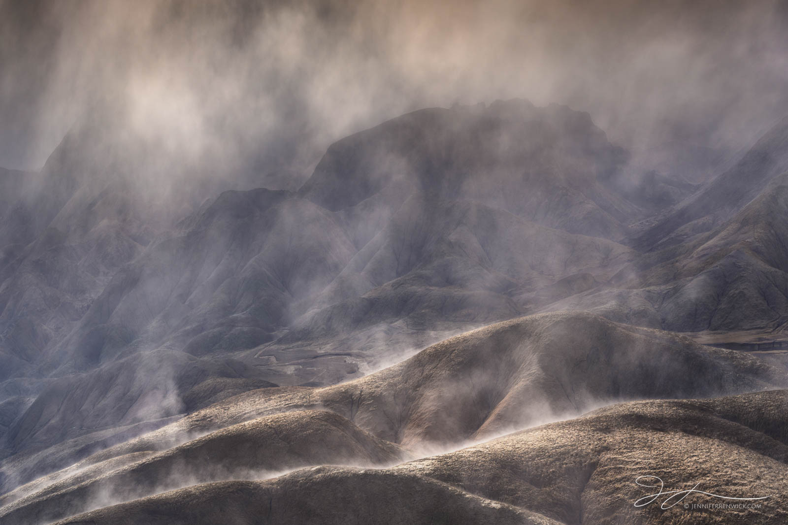 Steam rises off the badlands as the sun breaks through the clouds. The previous night, it had rained, and in the morning I was...