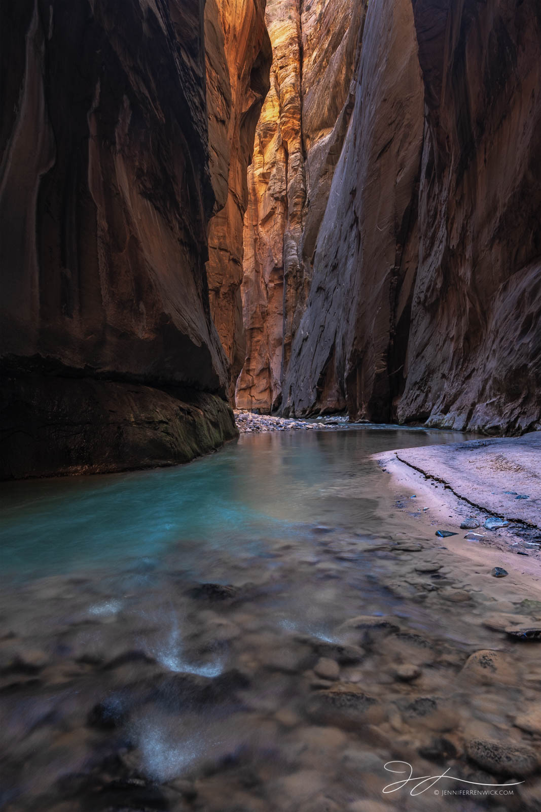 A quiet bend reflects canyon glow in the Zion Narrows.